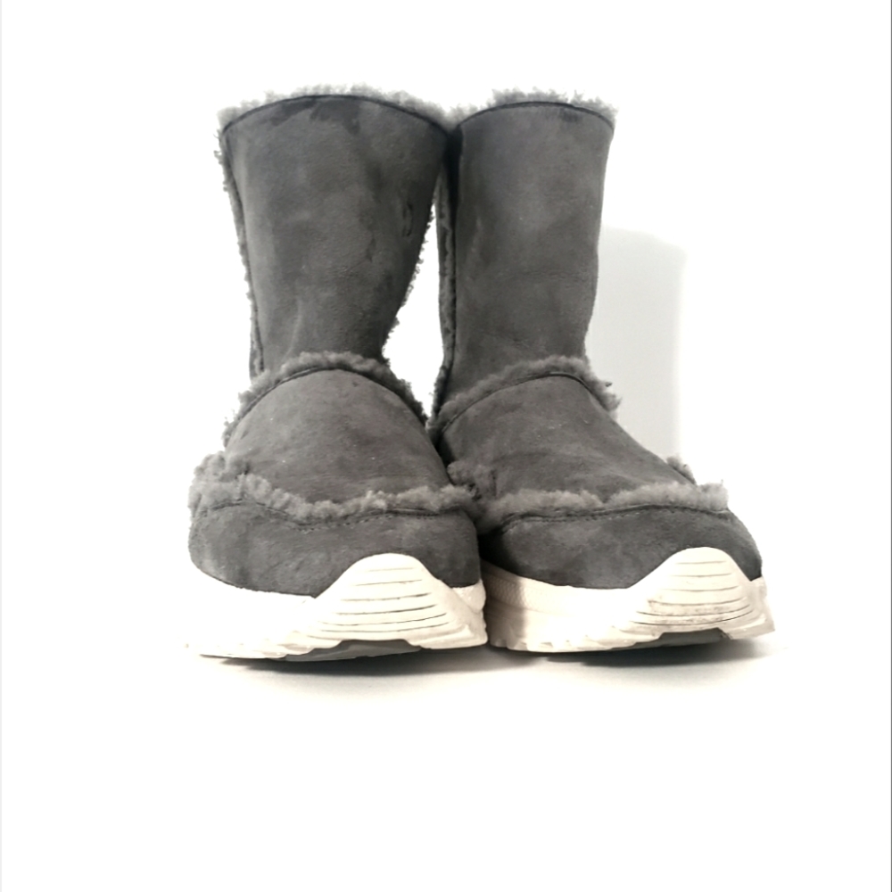 Coach ugg style boots .